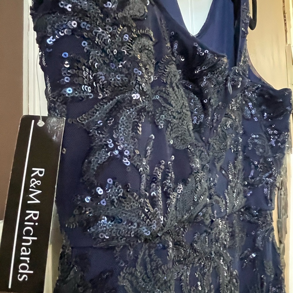 Brand NEW, JM Richard’s size 12 long navy gown with tag on.